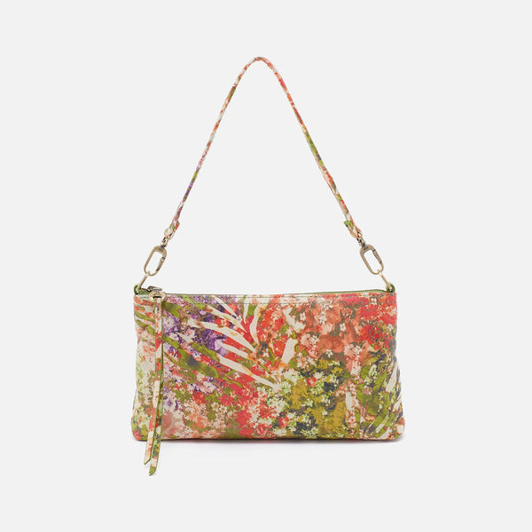 Front of HOBO Darcy Crossbody, Baguette, Wristlet, Convertible Bag in Tropic Floral Printed Leather With Solid Leather Strap and Zippered Top Pocket