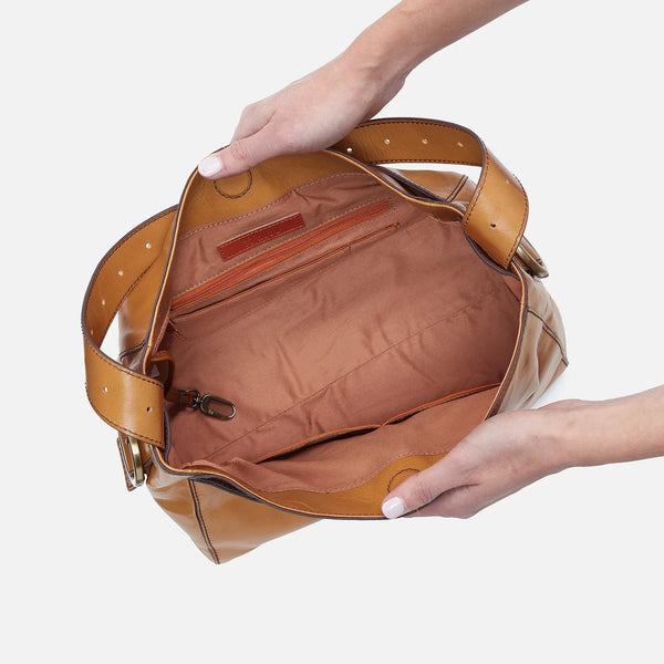 Top Down View of HOBO Render Shoulder Bag. A Medium Sized Purse with 2 Slip pockets on one side and a zippered pocket with internal card slots on the other.