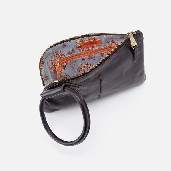 Opened HOBO Sable Wristlet Crafted in Black Polished Leather. Visible is an internal zippered pocket. Not Pictured is 6 internal credit card slots.