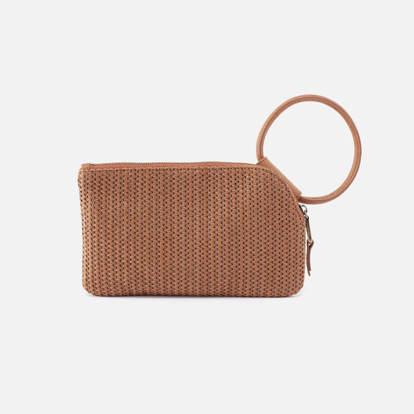 Back Side Of HOBO Sable Wristlet Crafted in Sepia Raffia Weave with Leather Trim. An Iconic Wristlet-Clutch Hybrid with a Circular Handle.