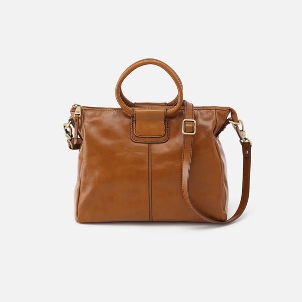 Front view of HOBO Sheila Medium Satchel in Truffle Polished Leather with Iconic Circular Carry Handle and Removable Shoulder Strap